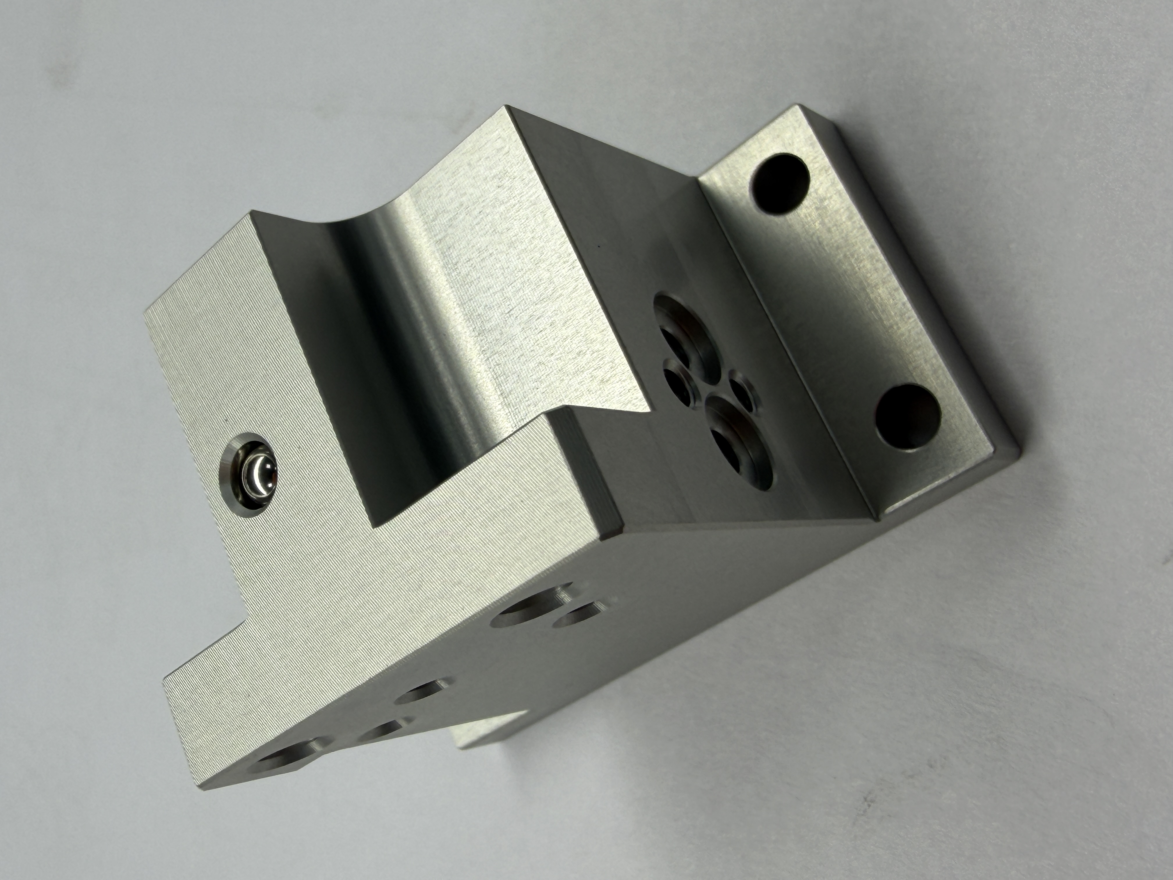 Precision machined metal bracket